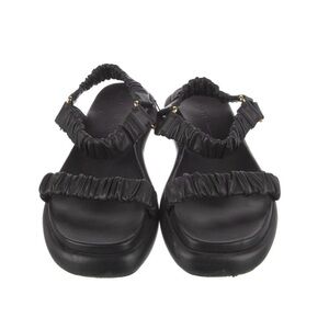 KHAITE Black Ruffled Sandals